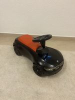 Rutschauto BMW Kinderfahrzeug schwarz/orange gut erhalten