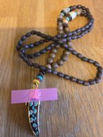 Vintage Boho Halskette mit Holzperlen und Anhänger..