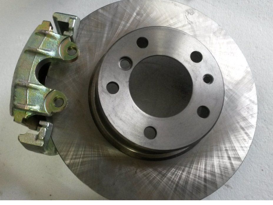 BMW Tutti pezzi di ricambio auto: BMW E34 Bremssattel + Bremsscheiben Satz – Nuovo e nell'imballaggio originale da Ruswil venduto da Braketec