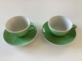 Zwei Rössler Kaffeetassen mit Unter-Teller