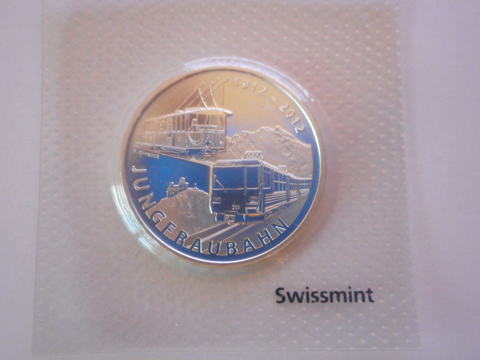 Tutti le monete: 20 Fr. 2012  silber  unz/stgl  Jungfraubahn – Nuovo e nell'imballaggio originale da Kriegstetten venduto da pizlad2010 1