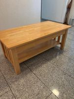 Couchtisch aus massivem Gummibaumholz
