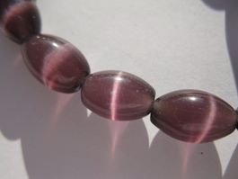 1 Strang Katzenauge oval, Amethyst 12x8mm