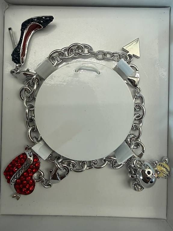 Bracciali & Braccialetti: Guess Armkette mit Charms – Usato da Stetten AG venduto da mik_2mq8