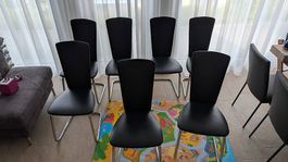 7 Freischwinger Stühle