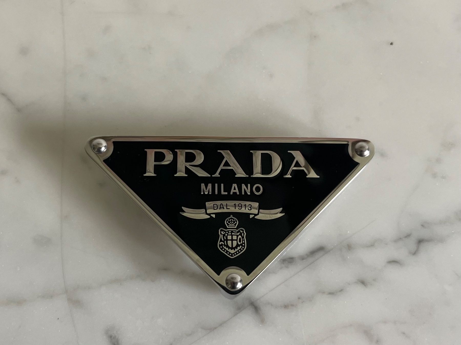 Fibbie per cinture: NEU Prada Gürtelschnalle, schwarz – Nuovo (secondo la descrizione) da Zollikon venduto da Mia_Zollikon