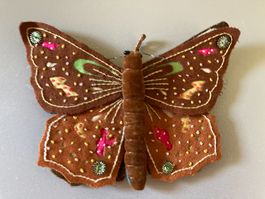 Antike Dekoration Schmetterling mit Mustern und Perlen
