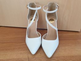 Chaussures Buffalo en cuir brillant blanc taille 36
