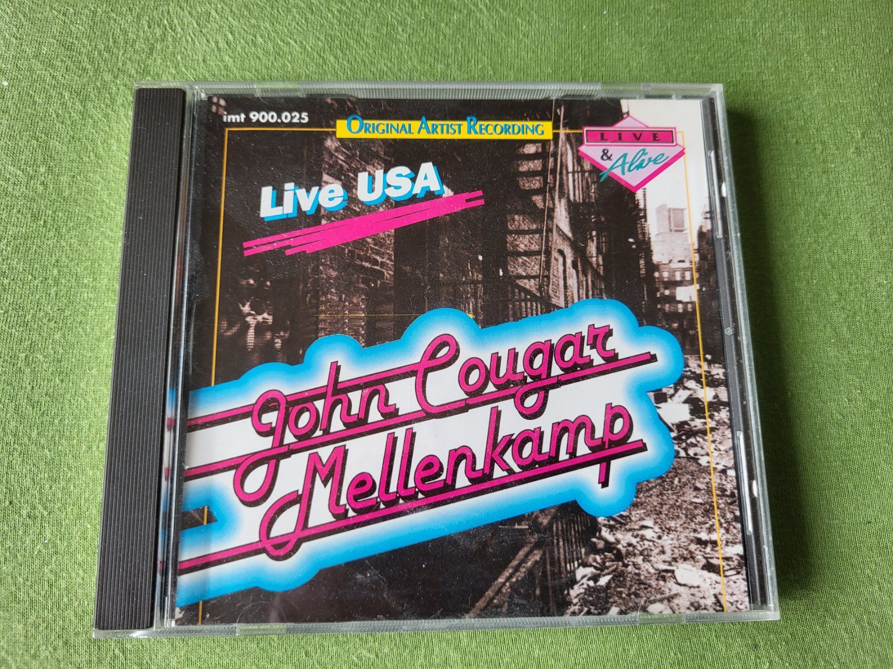 CDs: John Cougar Mellencamp Live USA 1980 – Gebraucht aus Münchenbuchsee von Elykinley