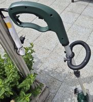 Débroussailleuse électrique verte, parfait état pour jardin 