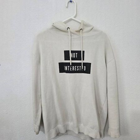 Pull blanc "Not Interested"