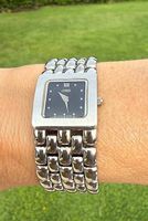 Montre acier et cadran noir