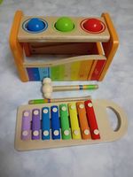 Holzspielzeug / Spiel aus Holz und Metall für Kleinkinder