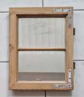 SPIEGEL im Fensterrahmen
