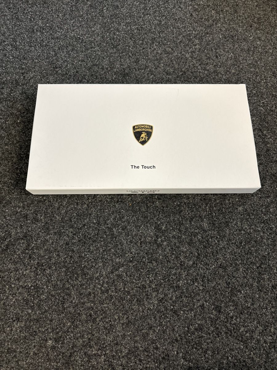 Guanti & manicotti: Lamborghini Huracan STO Handschuhe – Nuovo e nell'imballaggio originale da Oftringen venduto da lar_569b