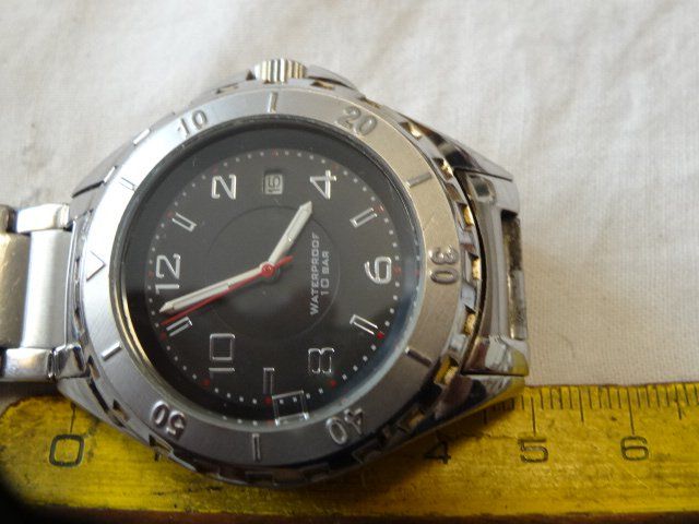 TCM Uhren: TCM HERREN UHR,QUARTZ,DATE.SCHÖNE MODEL.LÄÜFT. – Gebraucht aus zürich von ahmad01 2
