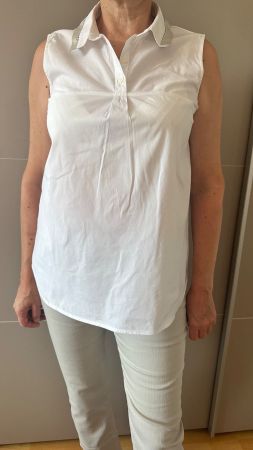 Chemise sans manches blanche taille 42 bon état
