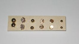 6 Ohrstecker goldfarbig (u.a. Kleeblatt, Halbkugel)