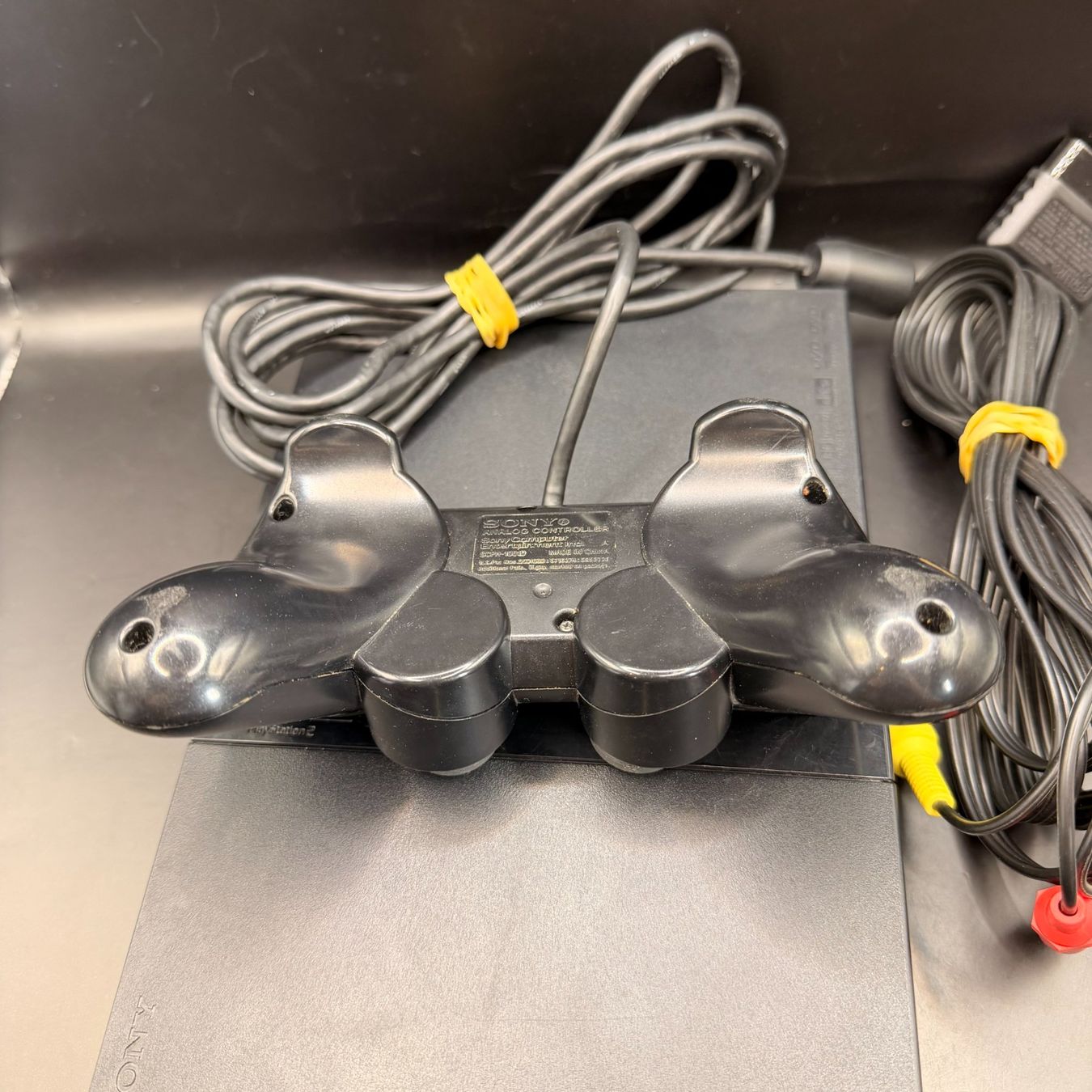 Sony Console: Sony PlayStation 2 PS2 Slim Schwarz – Usato da Düdingen venduto da Nerdworld 1