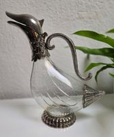 Glas-Krug/Karaffe in Entenform mit Silberbeschlägen.