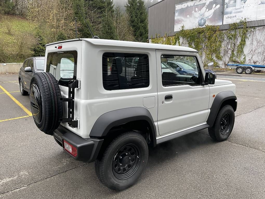 Scale: Suzuki Jimny Heckleiter ausklappbar – Nuovo e nell'imballaggio originale da Schindellegi venduto da GlobalCarTrading_AG 3