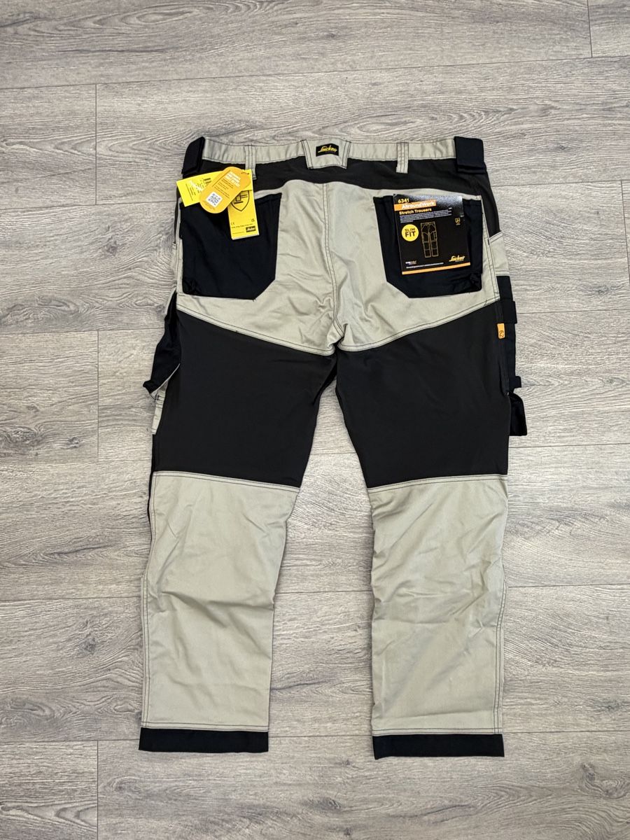 Snickers Pantaloni: pantalon de travail Snickers 6341 AllroundWork – Nuovo e nell'imballaggio originale da Lausanne venduto da OFFICINA.shop 1