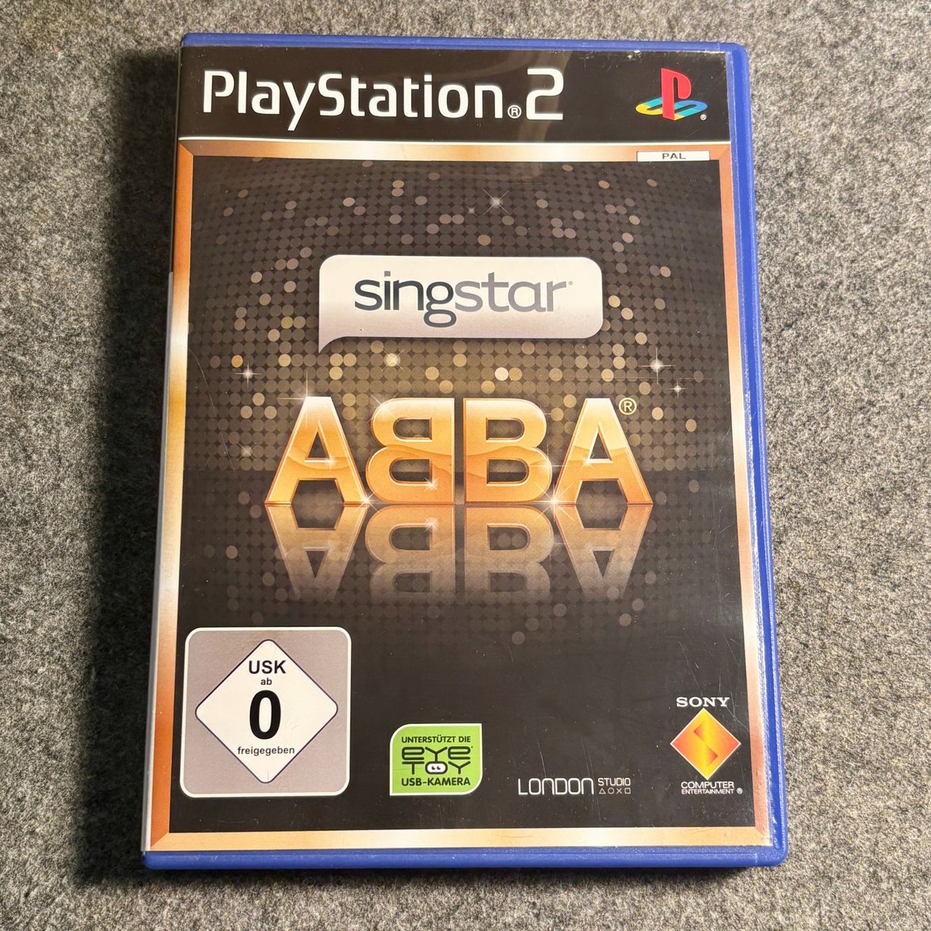 Jeux: Abba Singstar PS2 – D'occasion à Mollis par GamingCorner