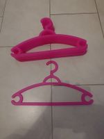 10 pinkige Kleiderbügel