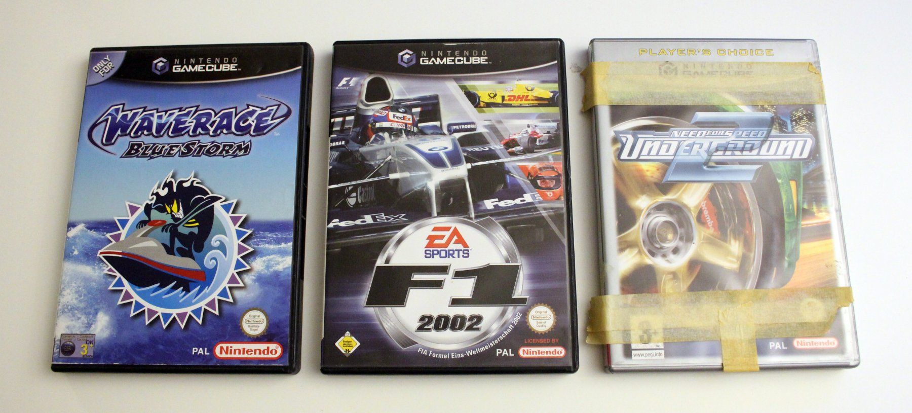 Spiele: Wave Race + F1 2002 + NFS Underground 2 – Gebraucht aus Münchenbuchsee von Chaoo