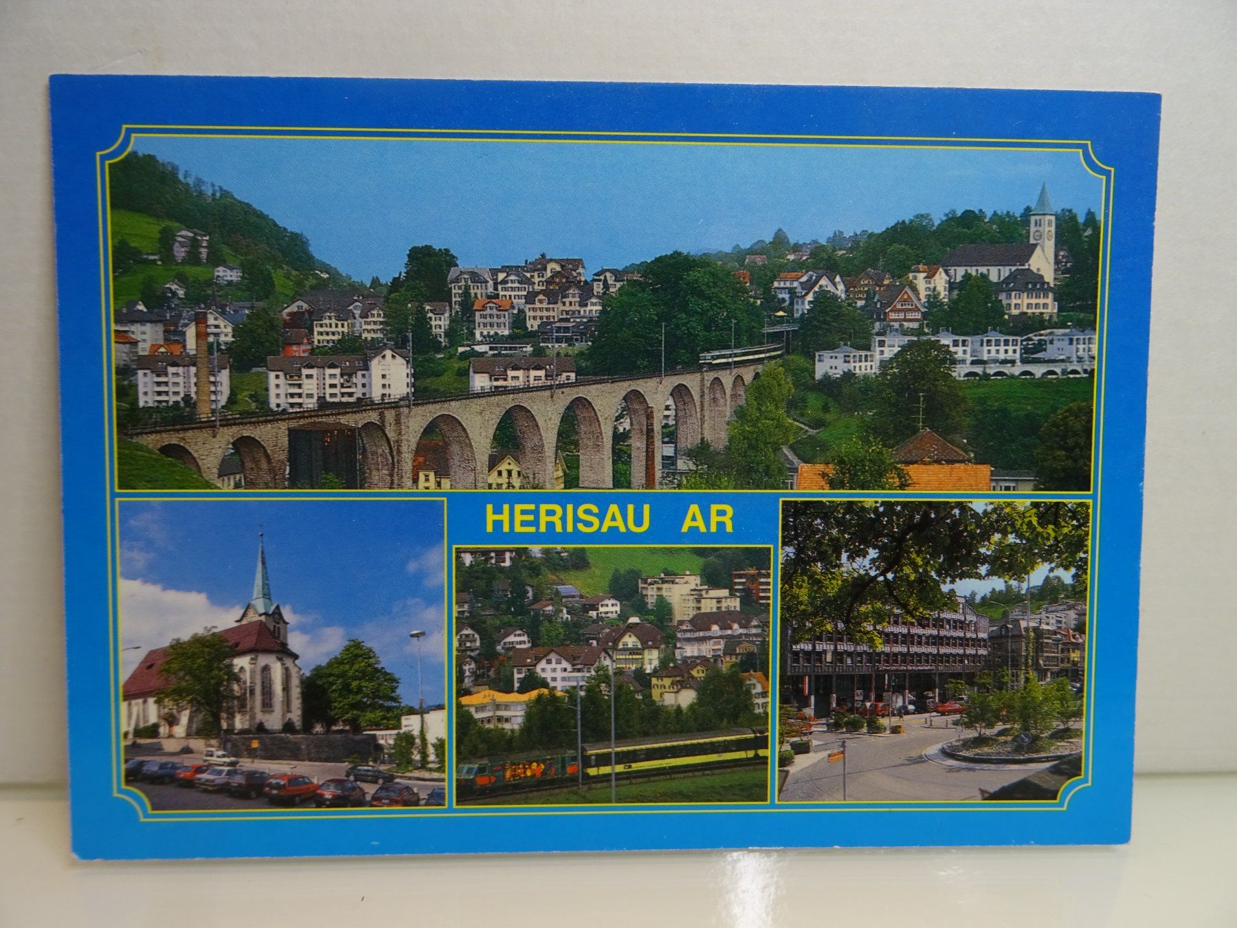 Cartoline postali: Ansichtskarte Herisau AR Schweiz Viadukt Bahn Kirche Post... – Nuovo (secondo la descrizione) da Teufen AR venduto da Brandan2171