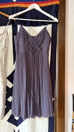 Robe violette avec torsade sur le devant taille 36