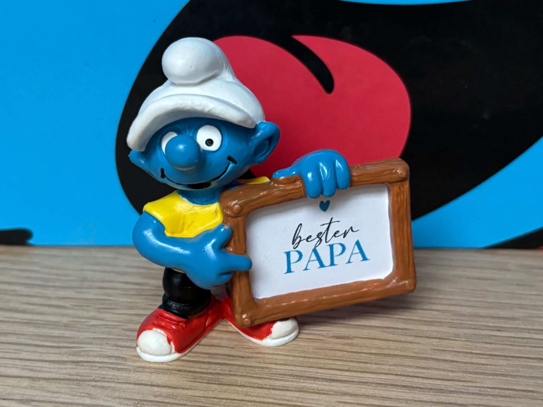 Schleich Figuren: Schlumpf mit Bilderrahmen: Bester Papa – Gebraucht aus Lyss von Duckszone