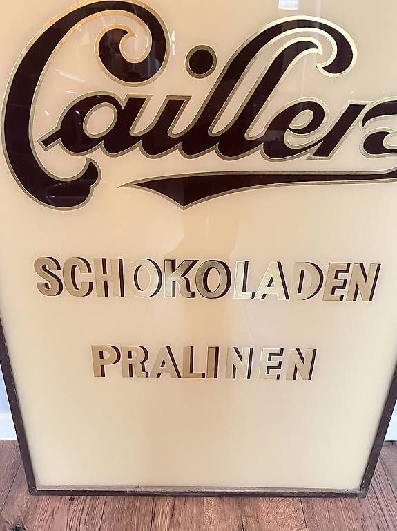 Cailler Insegne: Cailler Schokolade altes Hinterglas Schild Top zustand – Usato da Nidau venduto da Nintschgu 1