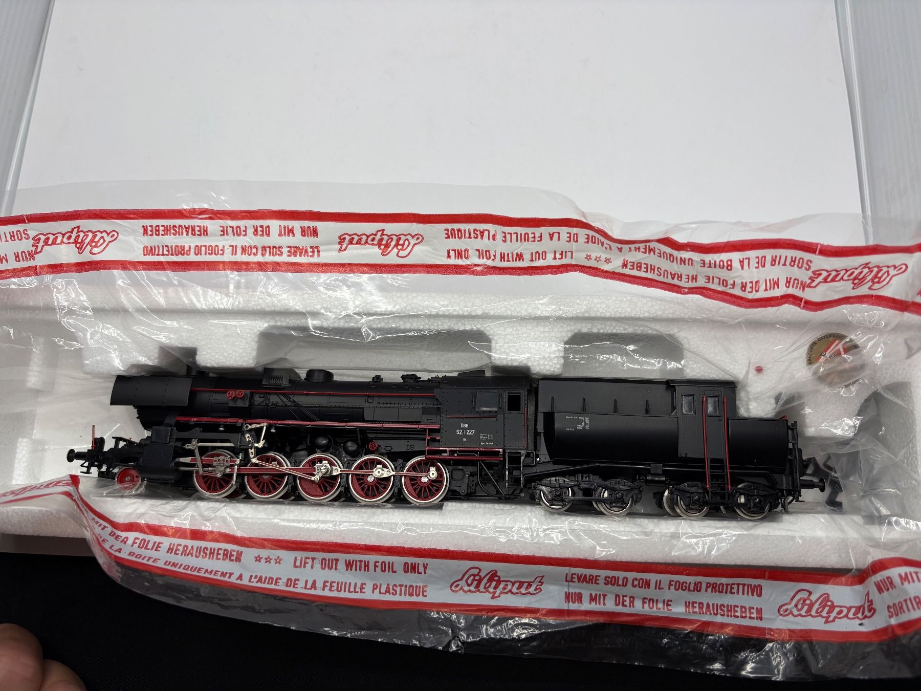 Liliput Modellini di ferrovie: Liliput ÖBB 52.1227 1/E H0 – Nuovo e nell'imballaggio originale da Forch venduto da Hanimann-Robinson 1