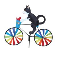 Windmühlenkatze auf dem Fahrrad