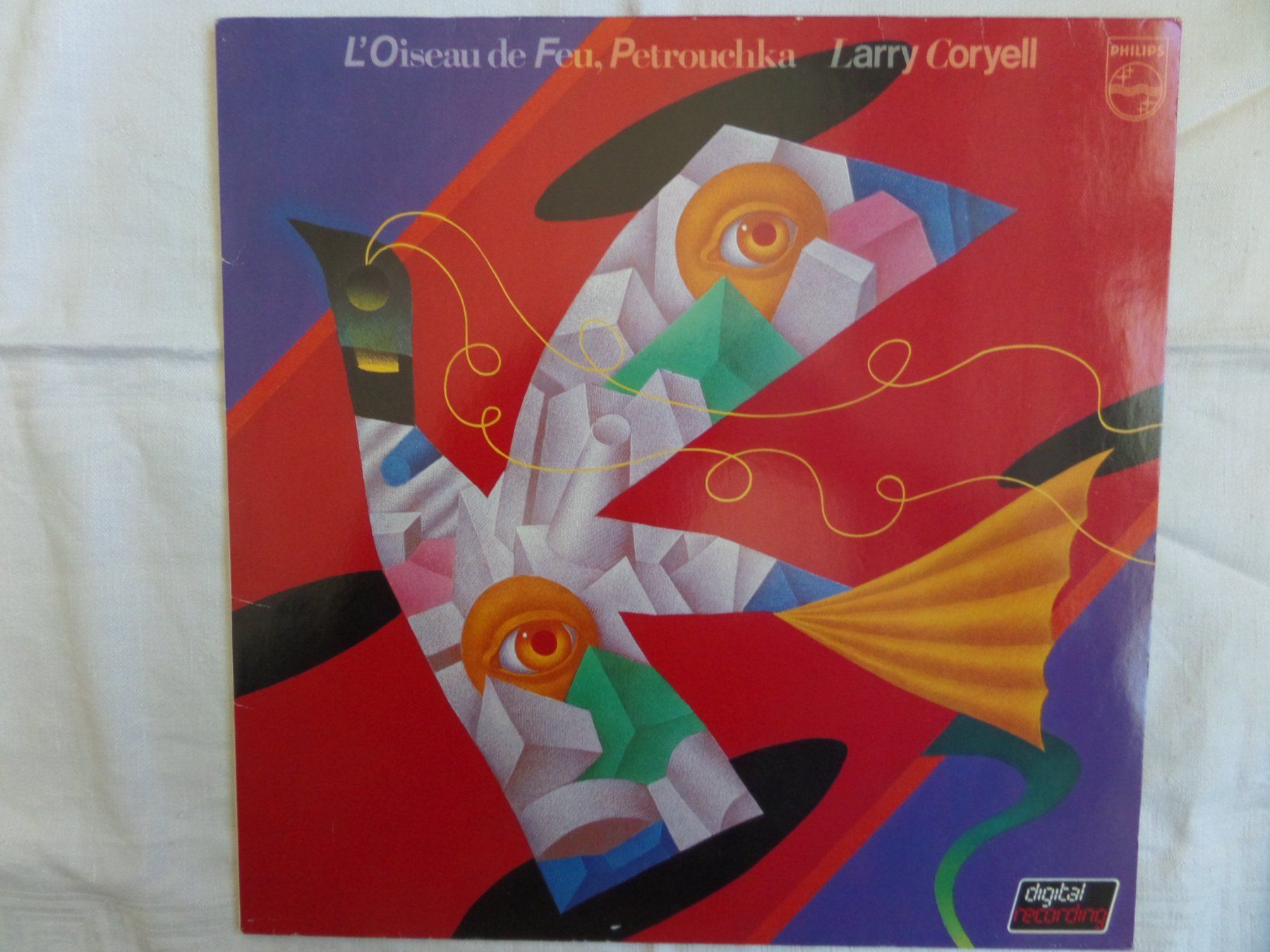 Vinyles: Larry Coryell ‎– L'Oiseau De Feu, Petrouchka – D'occasion à Genève par CDLPBookS
