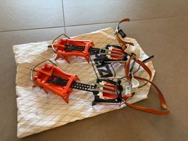 Petzl Lynx Steigeisen + Ultralight Pouch + Frontpoint-Set