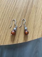 Boucle d’oreille en argent