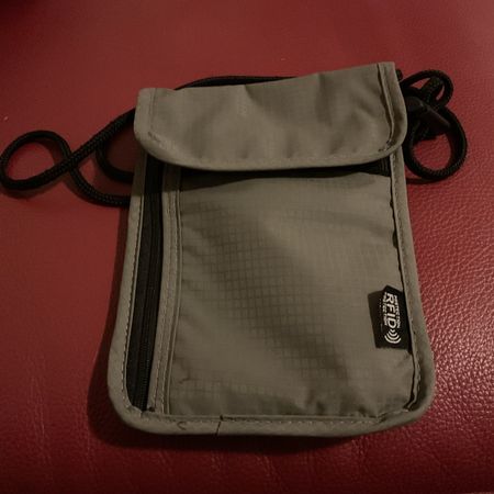 Bag passport, mobile, card and cash
