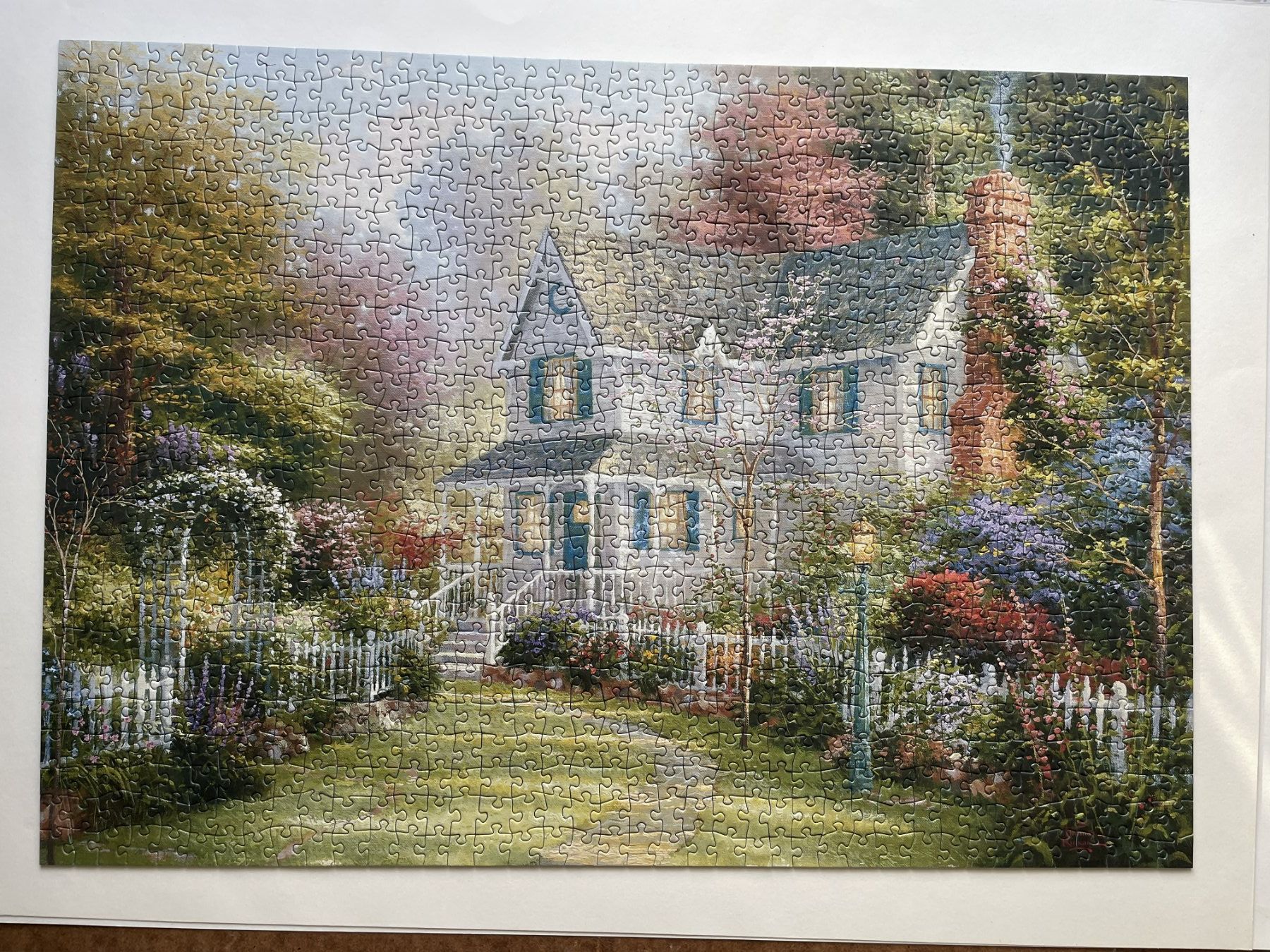 Puzzles: Puzzle schon Haus mit Wald 1000 Teile – Gebraucht aus Pratteln von 66werni