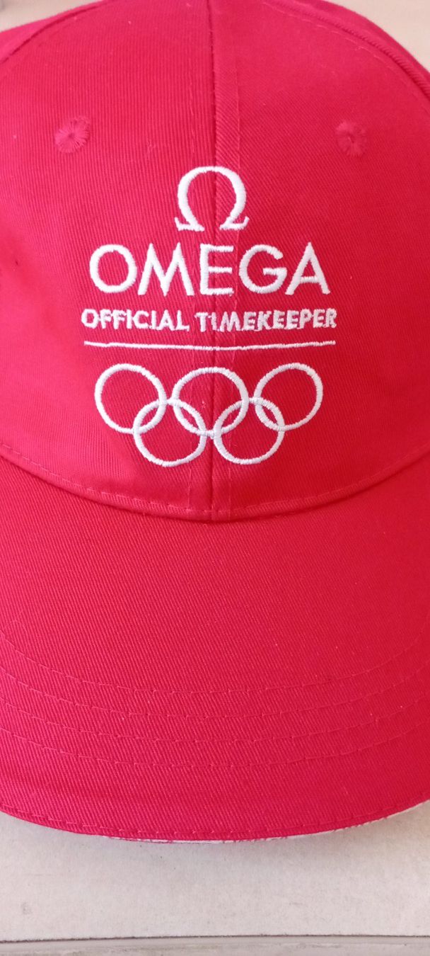 Copricapi, berretti & cappellini: originales Cap OMEGA Official Timekeeper Olympia 2026 – Nuovo (secondo la descrizione) da Pieterlen venduto da reisekultur 2