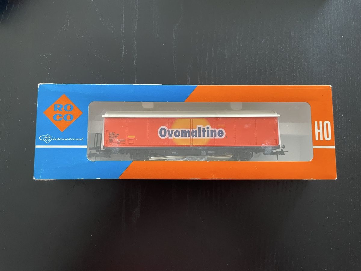 Roco Modellini di ferrovie: Roco Güterwagen Hbils-vy Ovomaltine – Nuovo e nell'imballaggio originale da Biasca venduto da gven94