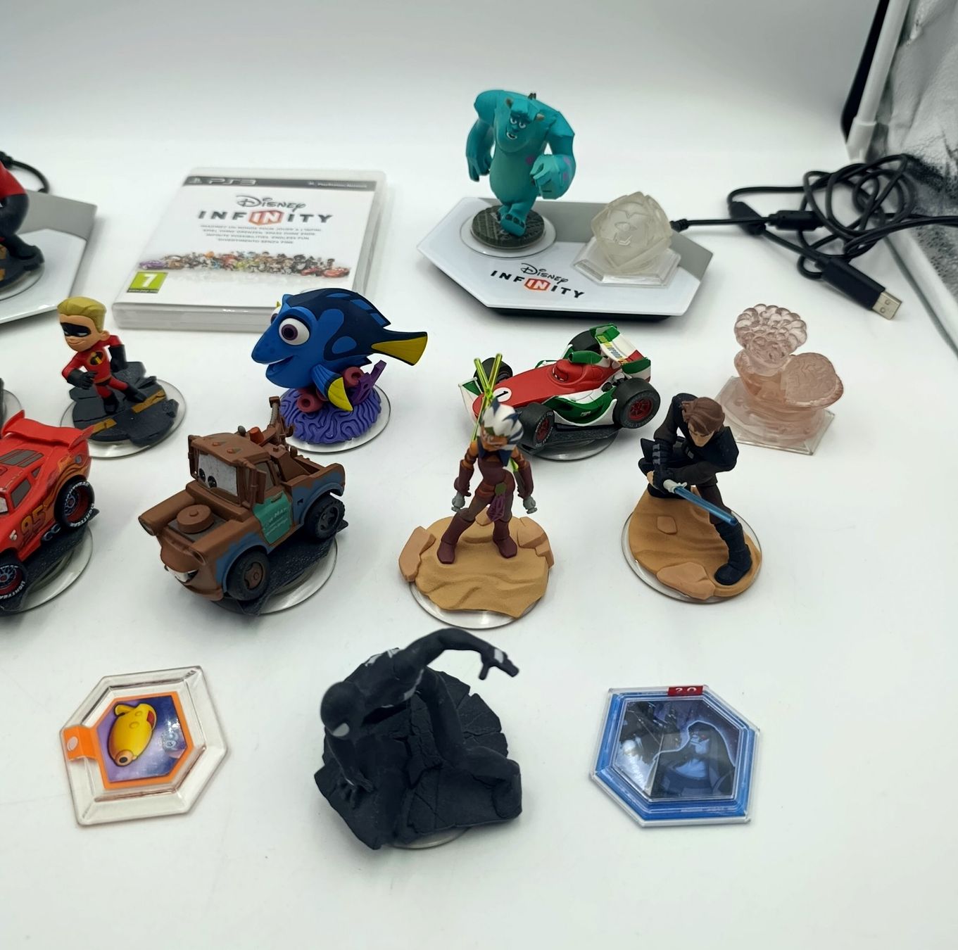 Disney Giochi: Disney Infinity Figuren und Spiel PS3 Konvolut – Usato da Wil SG venduto da Donaldus 2