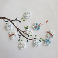 6 Blumen + 3 Schmetterlinge gehäkelt (uncinetto) 734 A