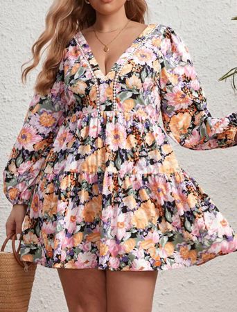 Sommerliches Blumenkleid mit Cut Out Gr. 56 / 58 / 60