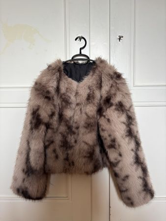 Veste fausse fourrure