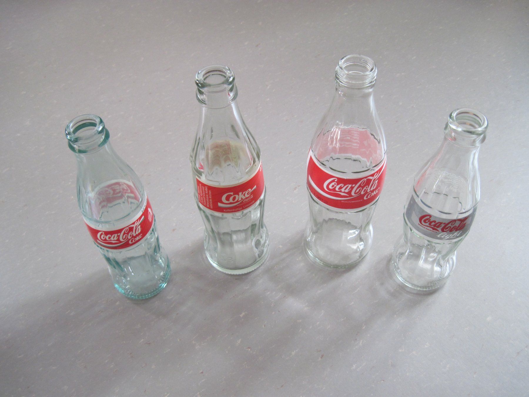 Coca-Cola Borracce & Thermos: Coca Cola Flaschen 4 Stück – Usato da Feuerthalen venduto da mam_5l7b 1