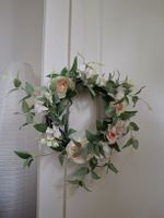 Couronne de fleurs artificielles