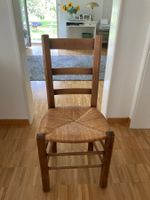 Holzstuhl mit Strohsitz braun gebrauchter Zustand