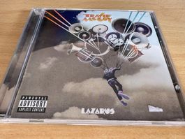 Travie McCoy – Lazarus